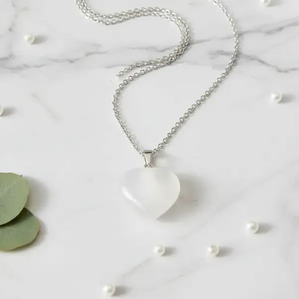 Dije d corazón blanco